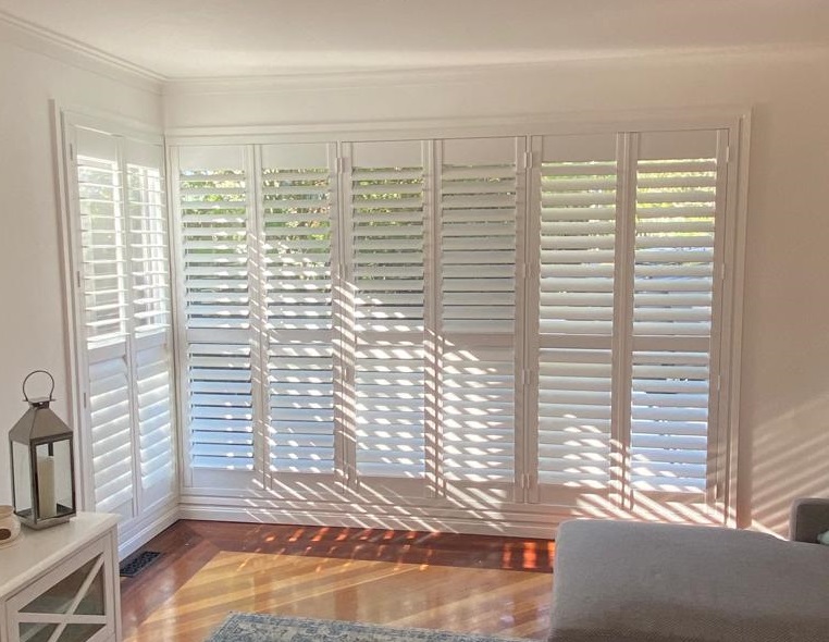 Indoor PVC plantation shutters offer a great solution for corner windows