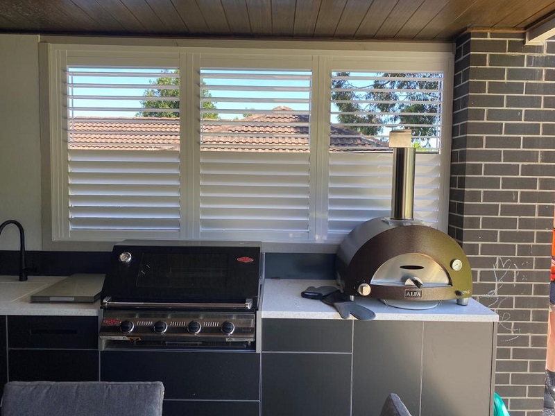 Aluminium Plantation Shutters installed in Outdoor Area with BBQ