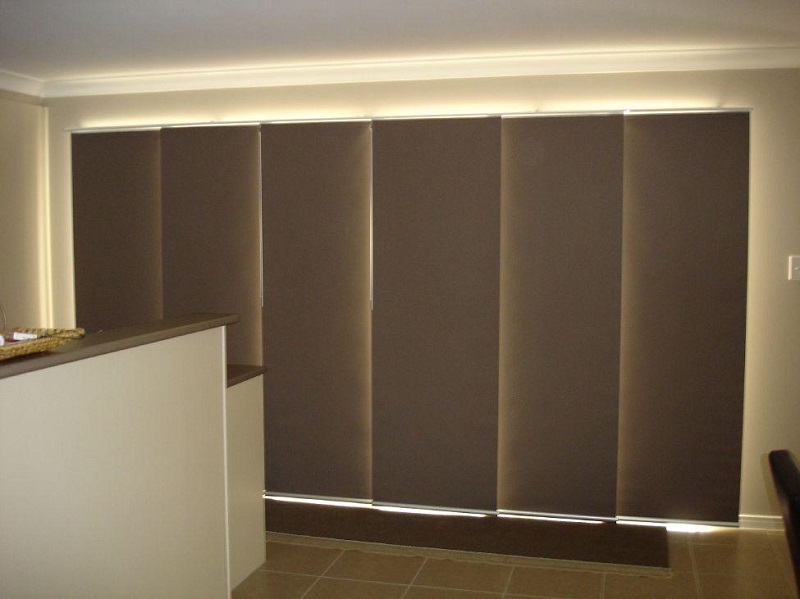 6 Sliding Panels in closed position over sliding doors in kitchen area