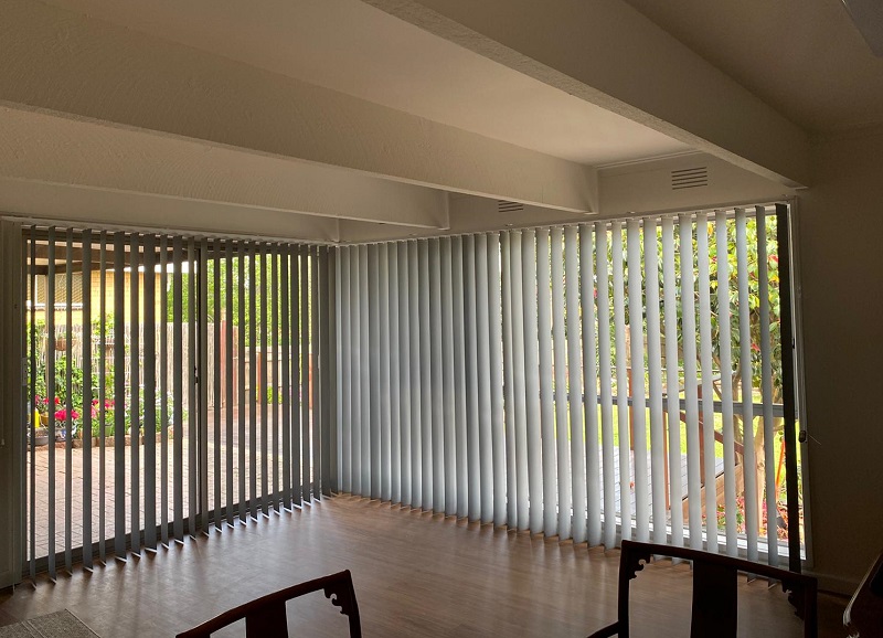 Vertical Blinds in dining room with open slats timber floors and exposed timber beams Hawthorn North